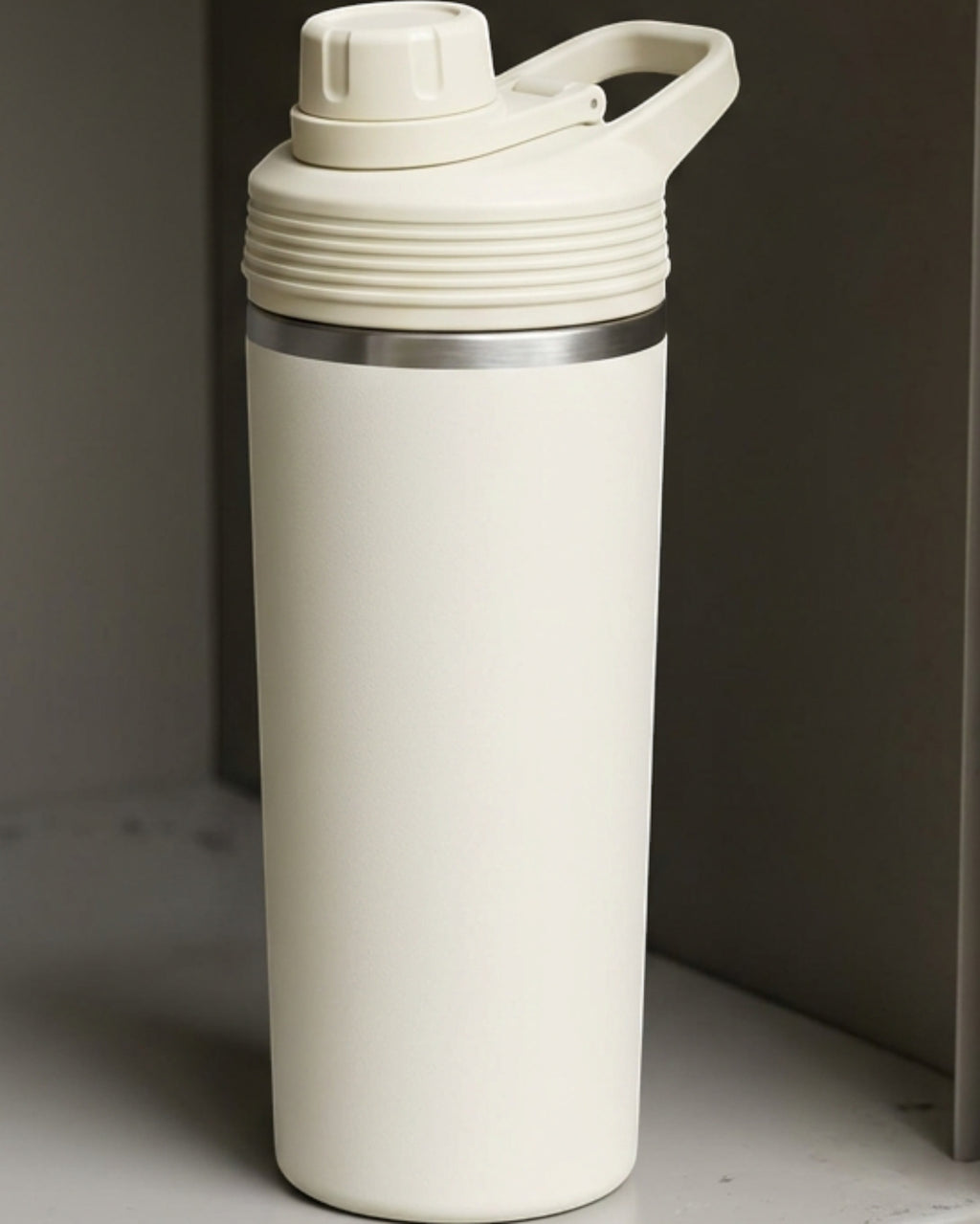 Xmkpb Protected-Straw Flip-Lid Double-Wall Travel Tumbler 20 oz Sage Cream - Lifestyle view
