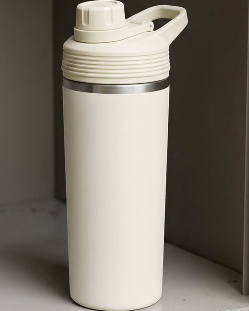 Xmkpb Protected-Straw Flip-Lid Double-Wall Travel Tumbler 20 oz Sage Cream - Lifestyle view